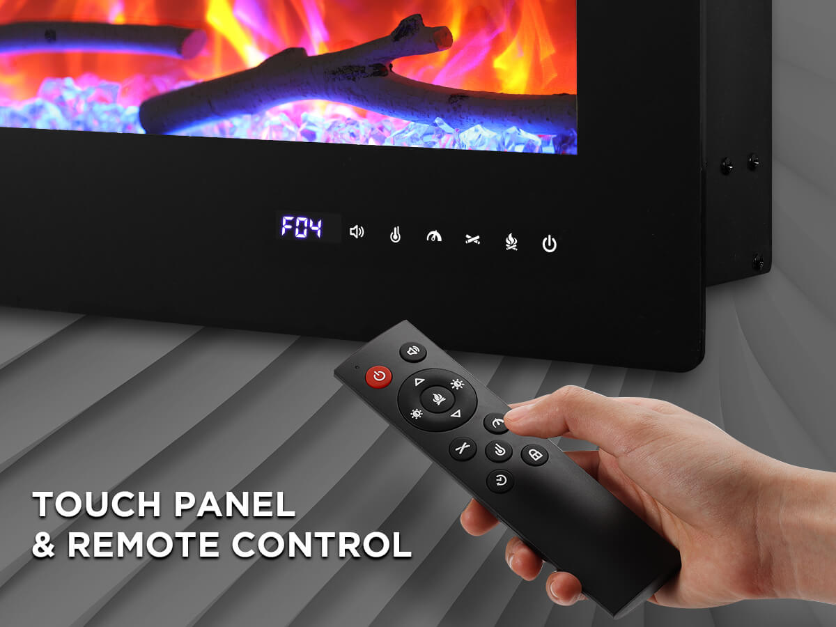 A hand holding a remote control for an electric fireplace with a touch panel display.