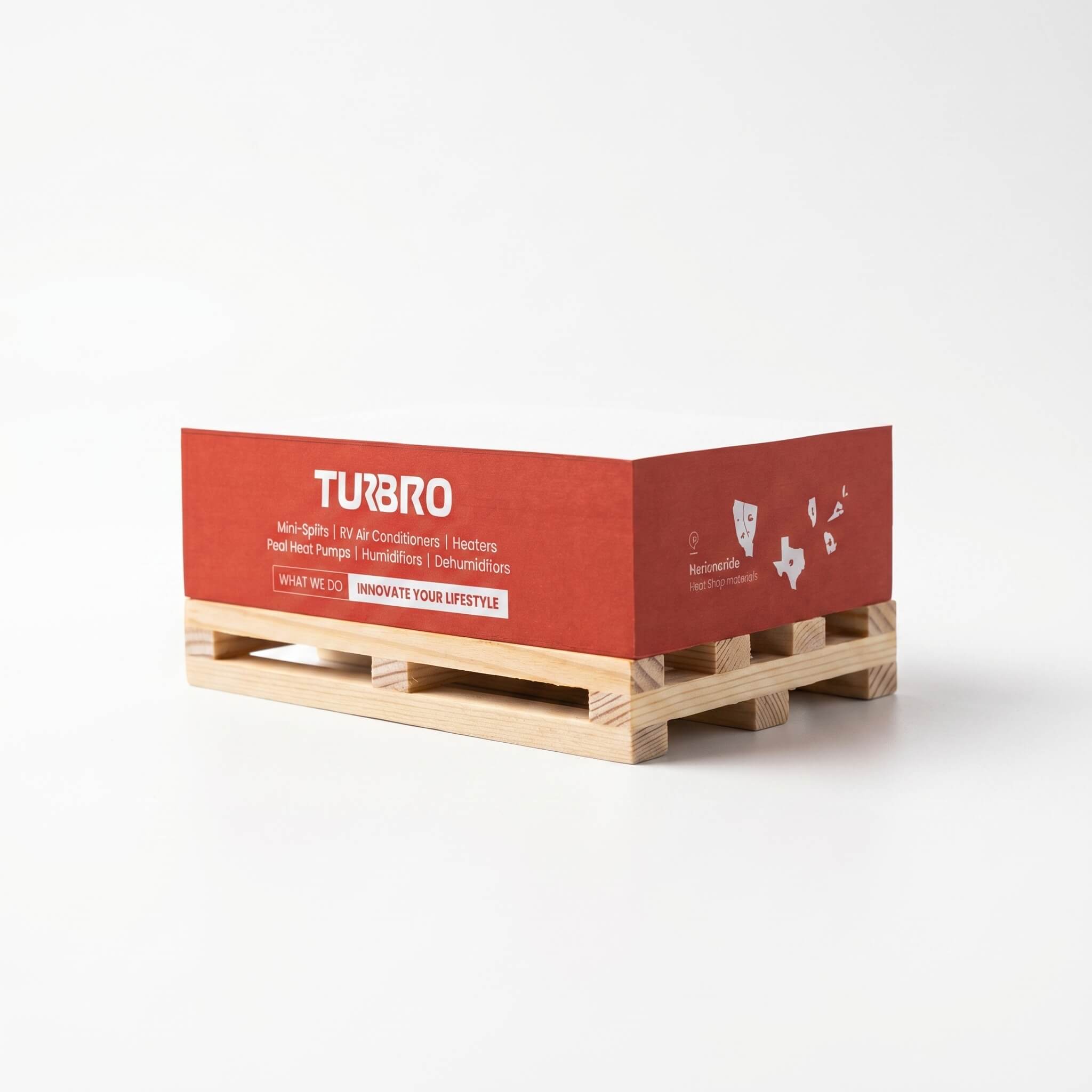 Wooden pallet with a red Turbo branded box on a white background